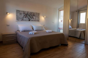 Elegante Rifugio nel Cuore di Olbia - Wifi Gratuito e Comfort nel Centro Città